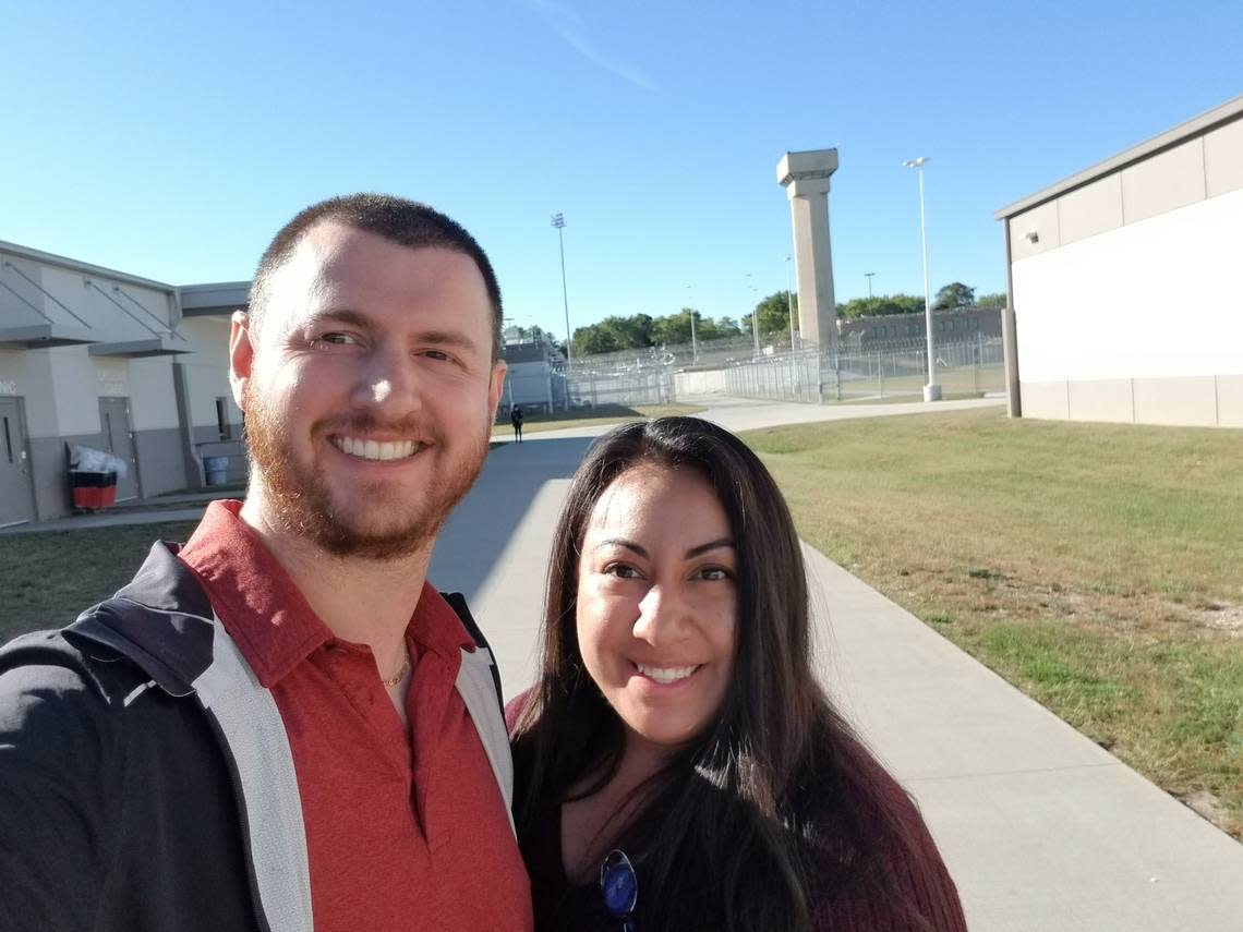 Cody Carter and his wife Valeria Carter standing inside Lansing Correctional Facility. Carter runs a prison ministry program with a branch in Kansas, which consists of a variety of faith and character-based classes such as anger management, substance abuse, Bible studies and more.