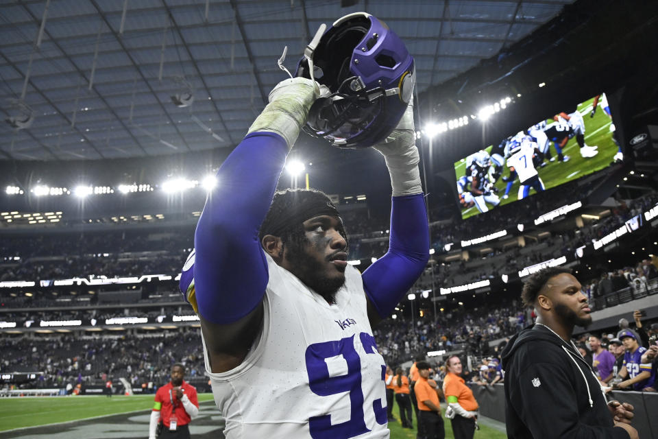 Minnesota Vikings defensive tackle Jaquelin Roy (93) celebrates after an NFL football game against the Las Vegas Raiders, Sunday, Dec. 10, 2023, in Las Vegas. (AP Photo/David Becker)