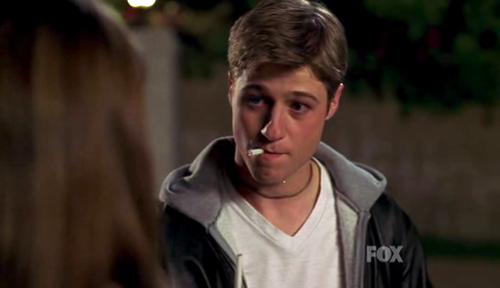 Ryan smoking a cigarette