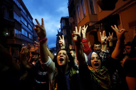 Supporters celebrate early election results outside the pro-Kurdish Peoples' Democratic Party (HDP) headquarters in Istanbul, Turkey, June 7, 2015. REUTERS/Murad Sezer