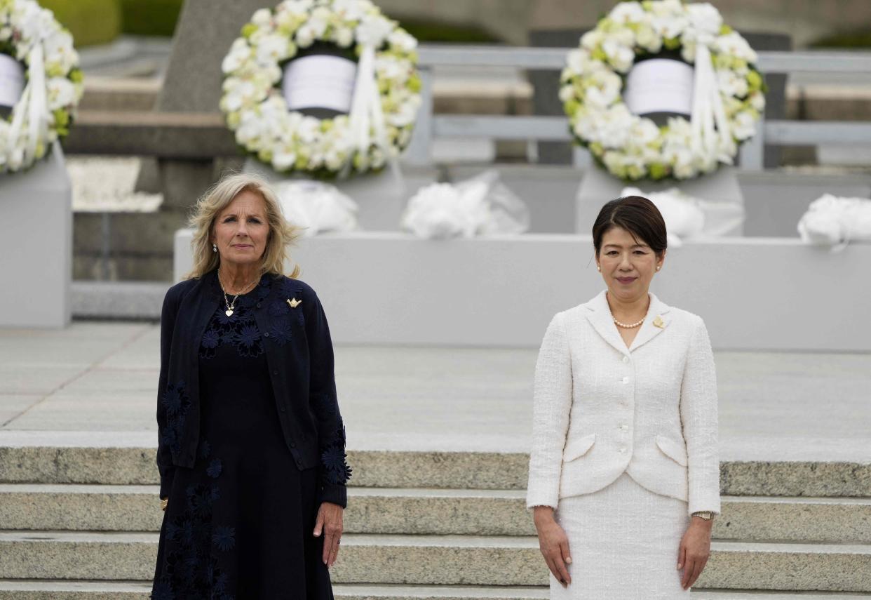 U.S. first lady Jill Biden and Japan first lady Yuko Kishida pose for a group photo after a flower wreath-laying ceremony at the Cenotaph for Atomic Bomb Victims in the Peace Memorial Park as part of the G7 Leaders' Summit in Hiroshima on May 19.