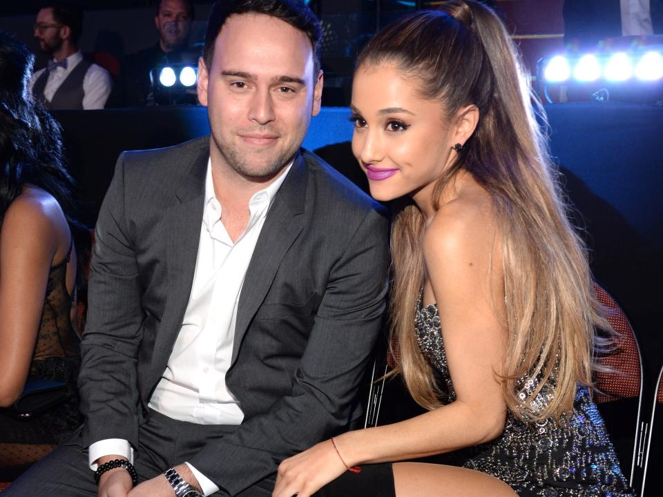 Scooter Braun and Ariana Grande attend the 2014 MTV Video Music Awards