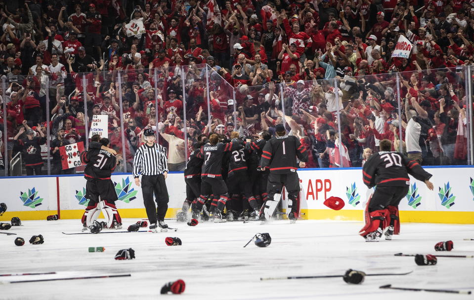 Canada celebrates the win over Finland during overtime of the world junior hockey championship gold medal game in Edmonton, Alberta, Saturday Aug. 20, 2022. (Jason Franson/The Canadian Press via AP)