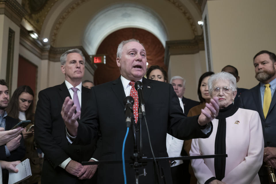 FILE - House Majority Leader Steve Scalise, R-La., is flanked by Speaker of the House Kevin McCarthy, R-Calif., left, and Rep. Virginia Foxx, R-N.C., as he talks to reporters at the Capitol in Washington, March 24, 2023. House Republicans are set to approve a sprawling energy package that counters virtually all of President Joe Biden's agenda to address climate change. (AP Photo/J. Scott Applewhite, File)