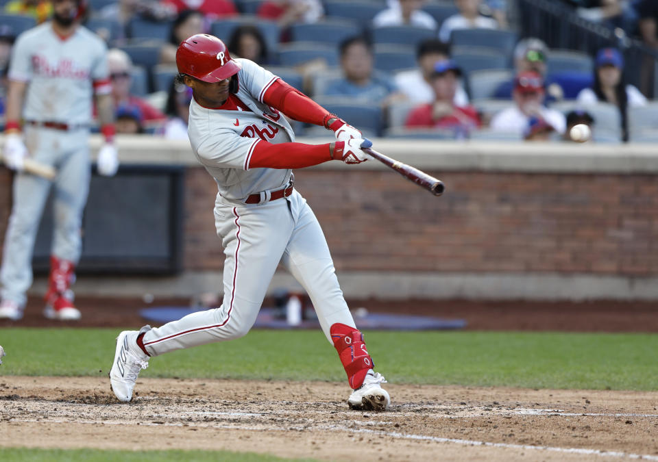 Phillies' Cristian Pache follows through on a single against the New York Mets during the ninth inning of a baseball game, Sunday, Oct. 1, 2023, in New York. (AP Photo/Noah K. Murray)