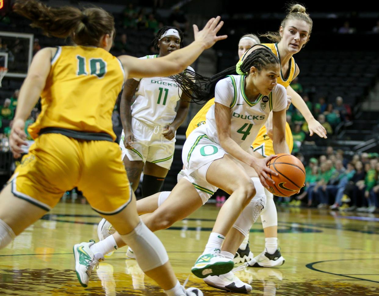 Oregon guard Endyia Rogers drives toward the basket as the Oregon Ducks take on North Dakota State in their WNIT opener Wednesday, Mach 15, 2023, at Matthew Knight Arena in Eugene, Ore. 