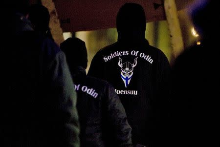 A group that call themselves the "Soldiers of Odin" demonstrate in Joensuu, Eastern Finland, January 8, 2016. REUTERS/Minna Raitavuo/Lehtikuva