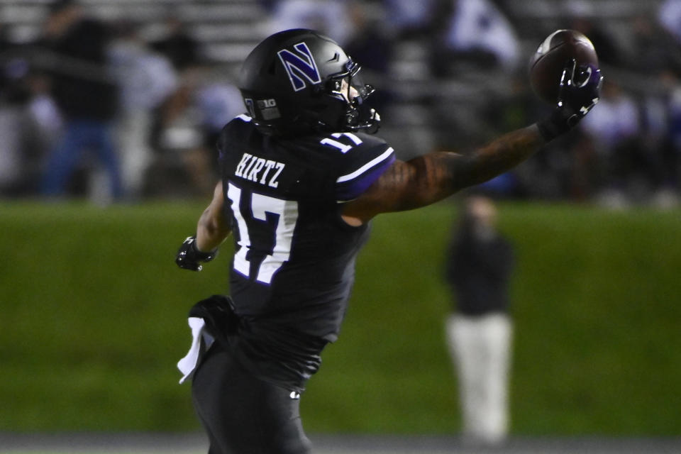 Northwestern wide receiver Bryce Kirtz makes a catch against Miami (Ohio) during the first half of an NCAA college football game Saturday, Sept. 24, 2022, in Evanston, Ill. (AP Photo/Matt Marton)