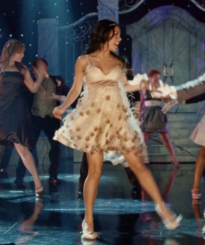 Gabriella dancing in her white dress