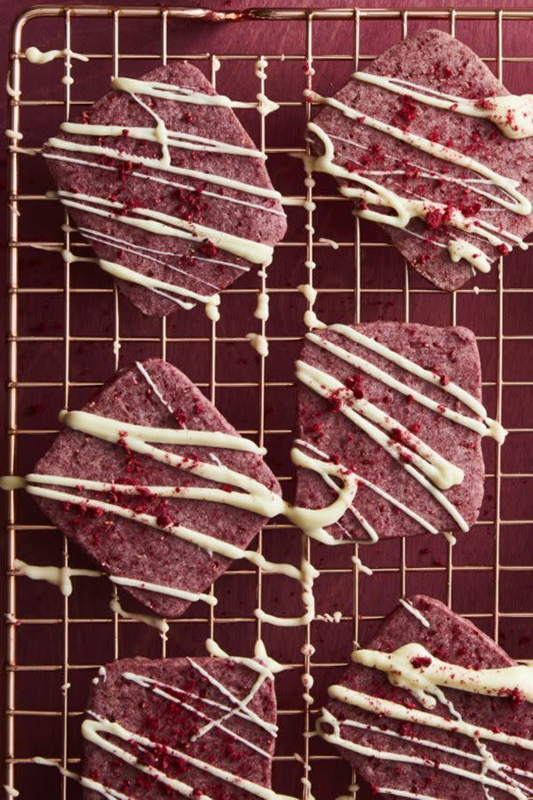 <p>The secret to these pretty-in-pink white chocolate cookies? Raspberry powder.</p><p><em><a href="https://www.goodhousekeeping.com/food-recipes/dessert/a25334483/white-chocolate-raspberry-thins-recipe/" rel="nofollow noopener" target="_blank" data-ylk="slk:Get the recipe for White Chocolate Raspberry Thins »;elm:context_link;itc:0;sec:content-canvas" class="link ">Get the recipe for White Chocolate Raspberry Thins »</a></em></p>