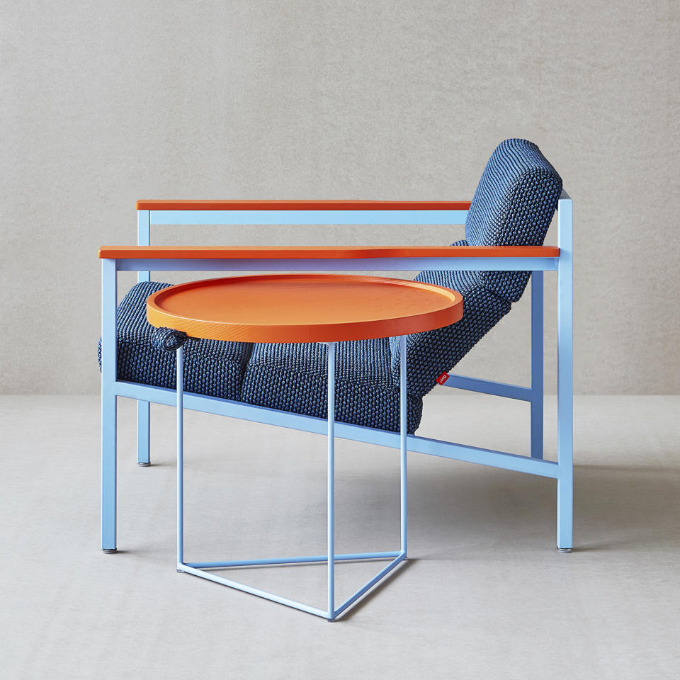 This undated photo provided by Beam shows the Gus* X LUUM Halifax Chair. Gus*Modern and LUUM collaborated on a collection of powder-coated steel, hardwood and performance-fabric upholstered chairs and side tables inspired by playful, colorful vibe of Memphis design. (Beam via AP)