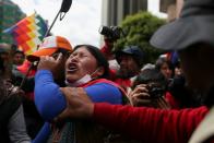 A supporter of Bolivia's ousted President Evo Morales reacts during a march in La Paz