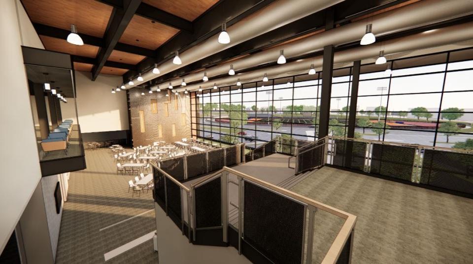 A rendering of a student commons inside the prosed new Diman building.