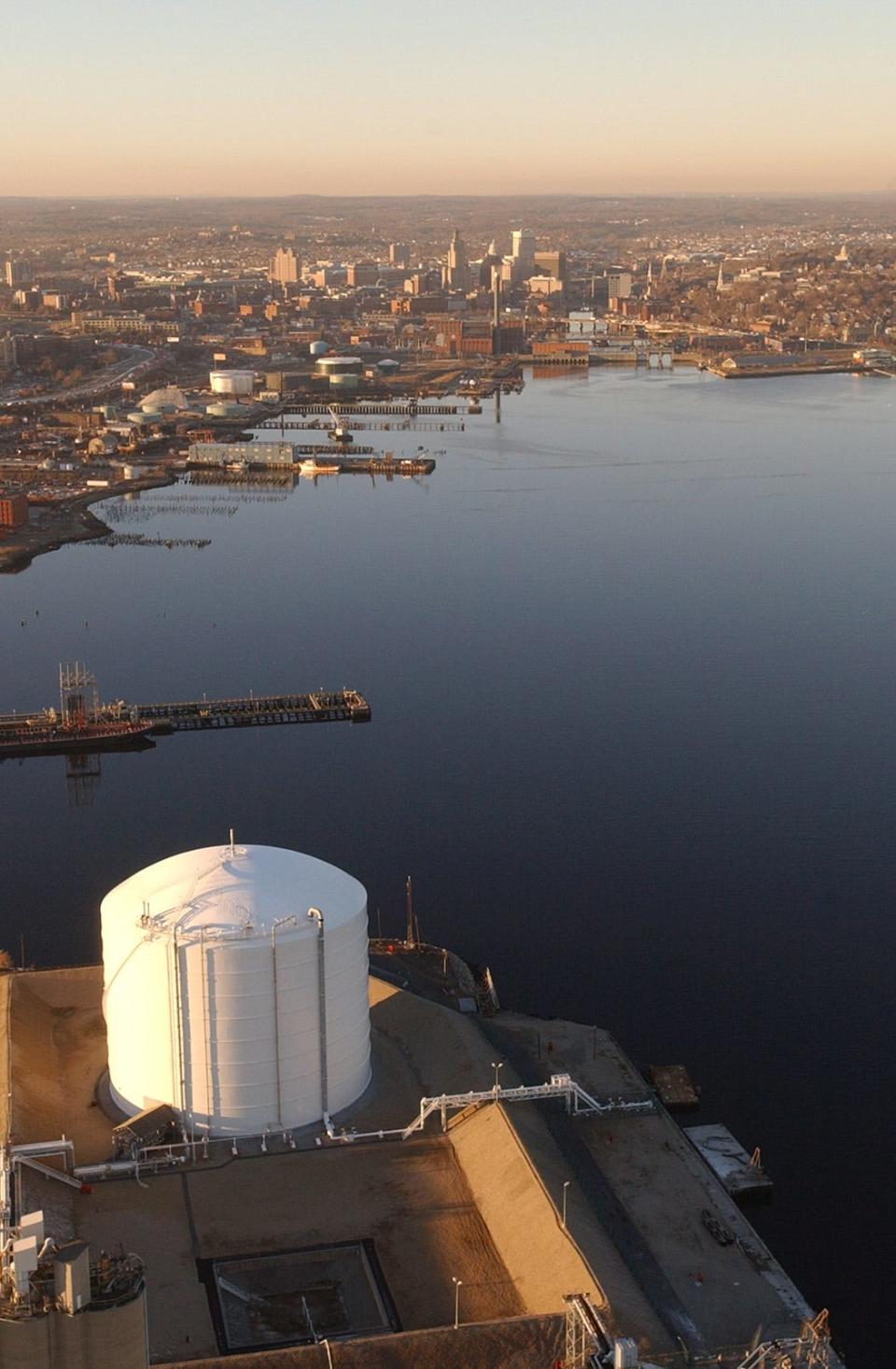 A giant tank that holds liquefied natural gas in Providence on the edge of the Providence River. National Grid won approval in 2017 to build a gas-liquefication plant nearby.