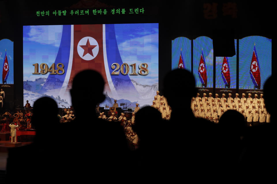 North Koreans military cadets are silhouetted as they attend an evening gala held on the eve of the 70th anniversary of North Korea's founding day in Pyongyang, North Korea, Saturday, Sept. 8, 2018. North Korea will be staging a major military parade, huge rallies and reviving its iconic mass games on Sunday to mark its 70th anniversary as a nation. (AP Photo/Kin Cheung)