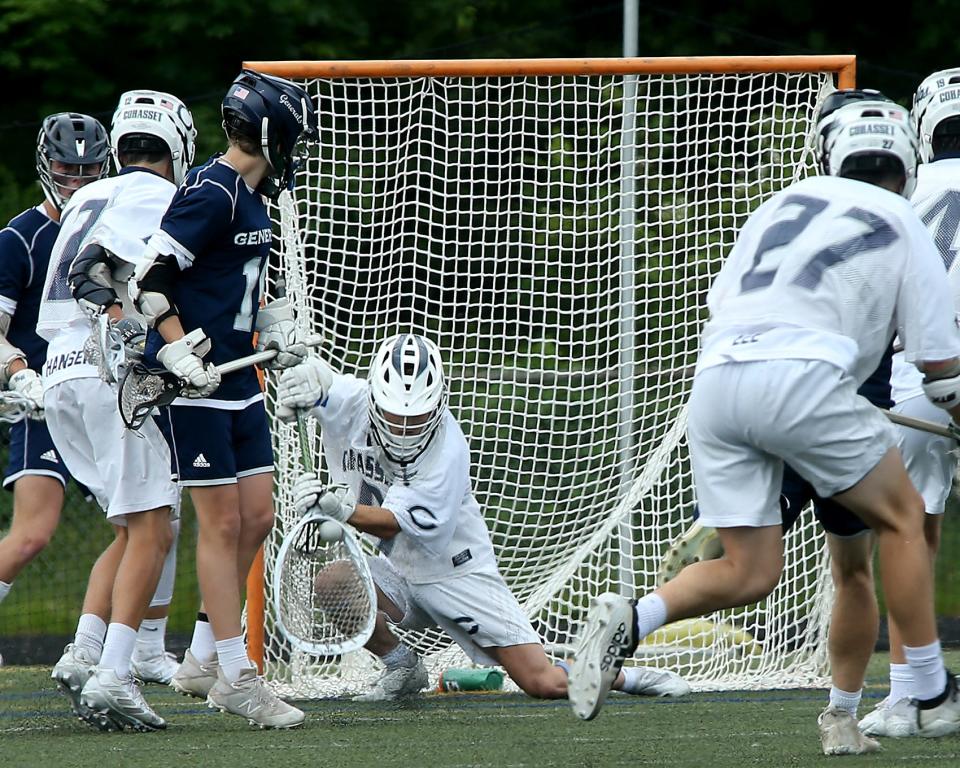 Cohasset goalie Anthony Kulturides makes a save during second quarter action of their game in the Sweet 16 round of the Division 4 state tournament at Cohasset High School on Saturday, June 11, 2022. 