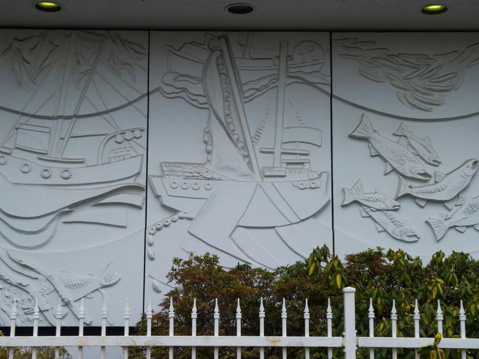  Panels of fishing scenes on a former Gulf and Fraser outlet in Vancouver in 2016.