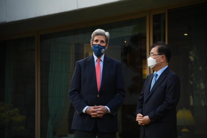 In this photo provided by U.S. Embassy Seoul, U.S. Special Presidential Envoy for Climate John Kerry, left, talks with South Korean Foreign Minister Chung Eui-yong upon his arrival for the banquet at the Foreign Minister's residence in Seoul, South Korea, Saturday, April 17, 2021. (U.S. Embassy Seoul via AP)