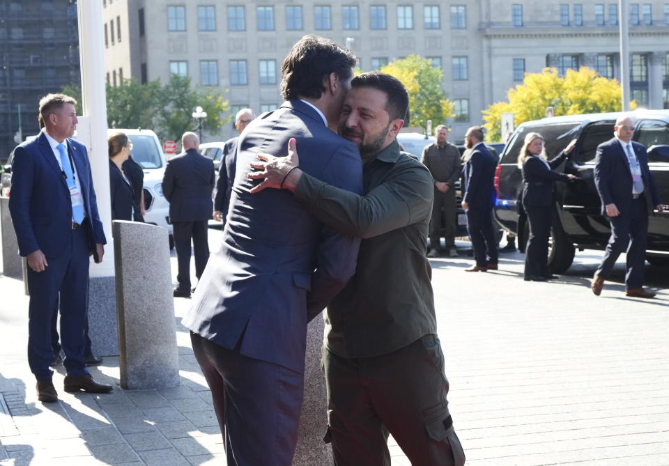 Prime Minister Justin Trudeau hugs Ukrainian President Volodymyr Zelenskyy as he arrives on Parliament Hill in Ottawa on Friday, Sept. 22, 2023. (Sean Kilpatrick /The Canadian Press via AP)