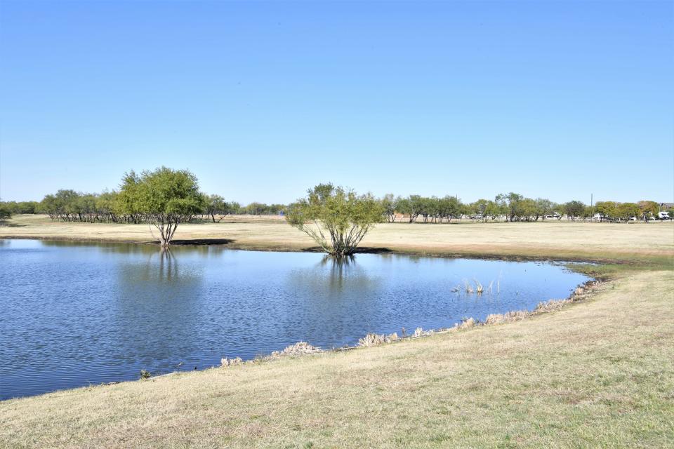 The field by the fishing pond at Jellystone Park at Wichita Falls will be renovated for approximately 50 additional RV sites in the location's second phase of changes.