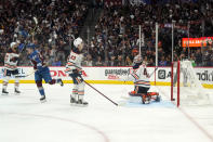 Colorado Avalanche left wing Artturi Lehkonen (62) celebrates a goal against Edmonton Oilers goaltender Mike Smith (41) during the second period in Game 2 of the NHL hockey Stanley Cup playoffs Western Conference finals Thursday, June 2, 2022, in Denver. (AP Photo/Jack Dempsey)