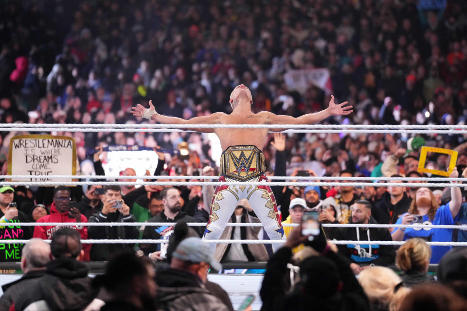 Cody Rhodes celebrates winning the Undisputed WWE Universal Championship during Wrestlemania XL Sunday at Lincoln Financial Field.