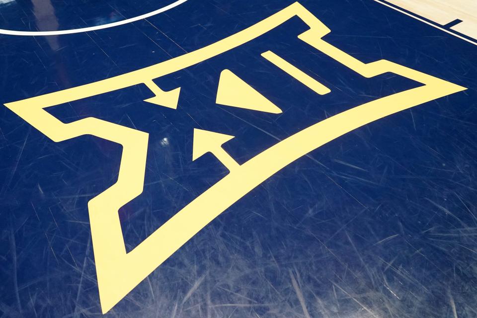 MORGANTOWN, WV - JANUARY 11:  The Big 12 logo on the floor before a college basketball game between the West Virginia Mountaineers and the Oklahoma State Cowboys at the WVU Coliseum on January 11, 2022 in Morgantown, West Virginia.  (Photo by Mitchell Layton/Getty Images) ORG XMIT: 775759078 ORIG FILE ID: 1364115359