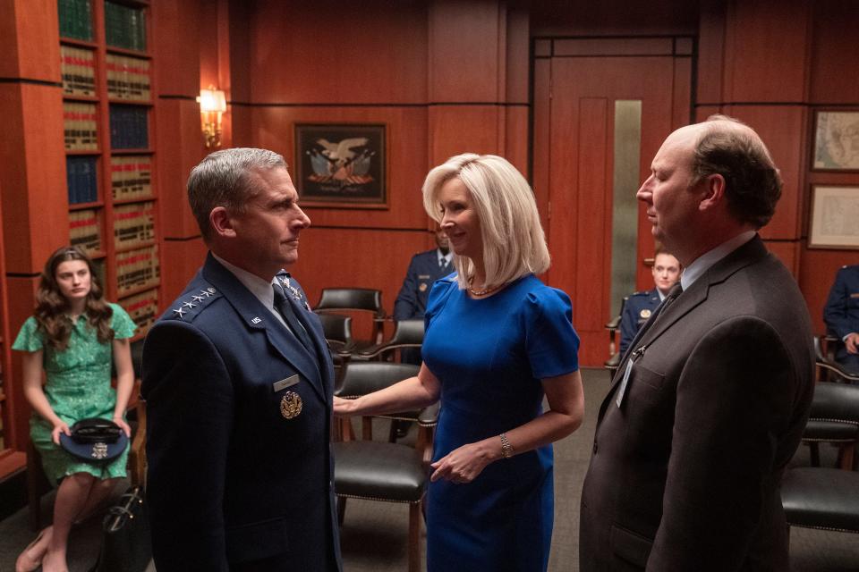 Lisa Kudrow, center, as Maggie Naird in Episode 1 of "Space Force."