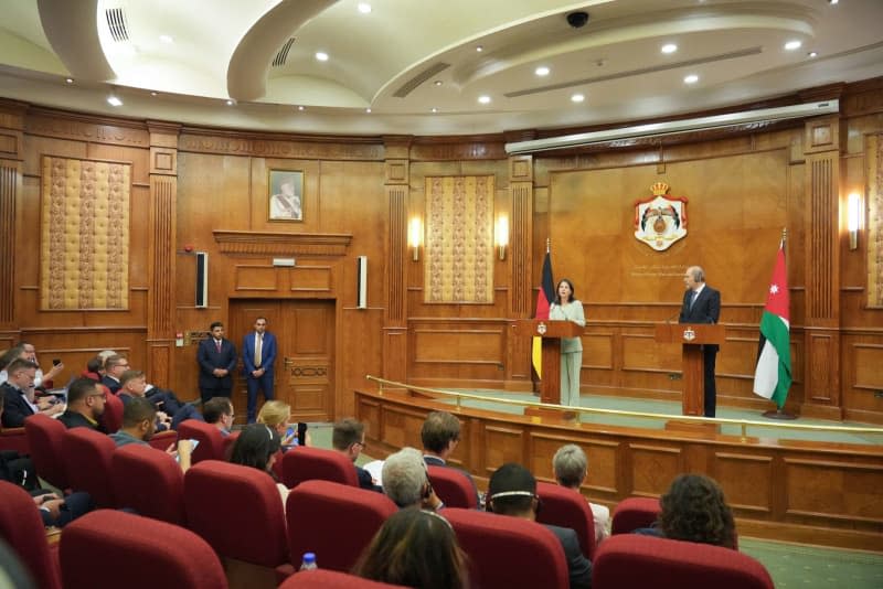 German Foreign Minister Annalena Baerbock speaks during a joint press conference with Jordanian Foreign Minister Ayman Safadi after their meeting. Soeren Stache/dpa