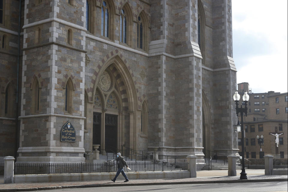 This Friday, Jan. 22, 2021, photo shows the Cathedral of the Holy Cross in Boston. According to the Boston Archdiocese’s website, its central ministries office received about $3 million, while its parishes and schools collected about $32 million more from the federal government’s small business emergency relief program in 2020. (AP Photo/Bill Sikes)