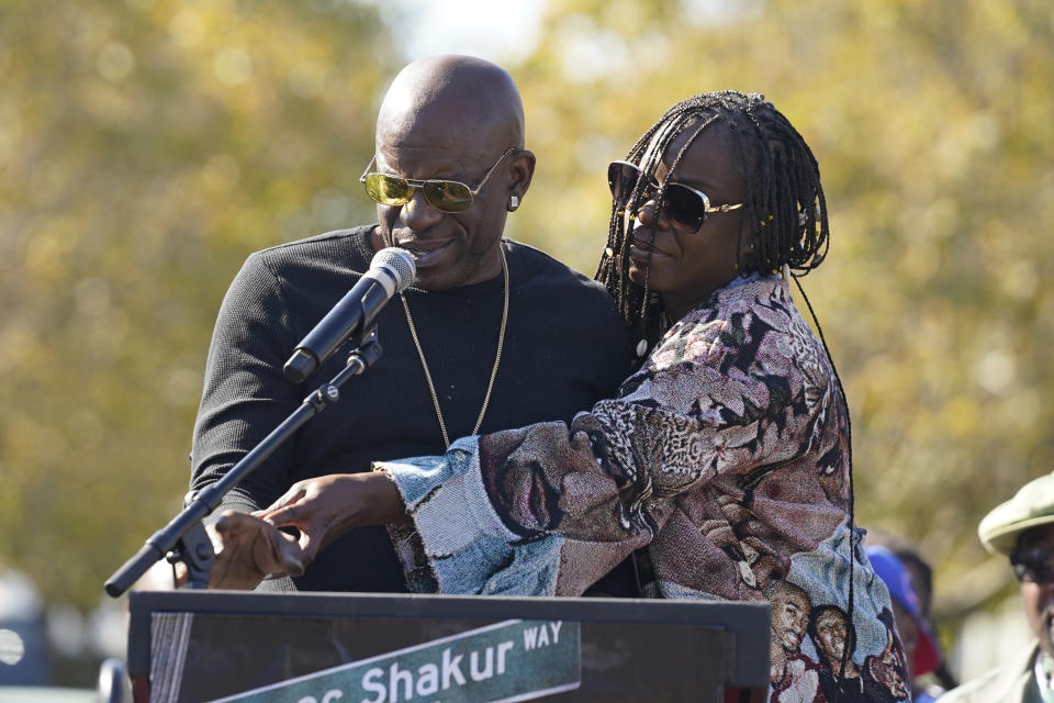 Mopreme Shakur, left, and Sekyiwa Shakur talk about their brother Tupac Shakur during a street renaming ceremony for Shakur in Oakland, Calif., Friday, Nov. 3, 2023. A stretch of street in Oakland was renamed for Shakur, 27 years after the killing of the hip-hop luminary. A section of Macarthur Boulevard near where he lived in the 1990s is now Tupac Shakur Way, after a ceremony that included his family members and Oakland native MC Hammer. (AP Photo/Eric Risberg)