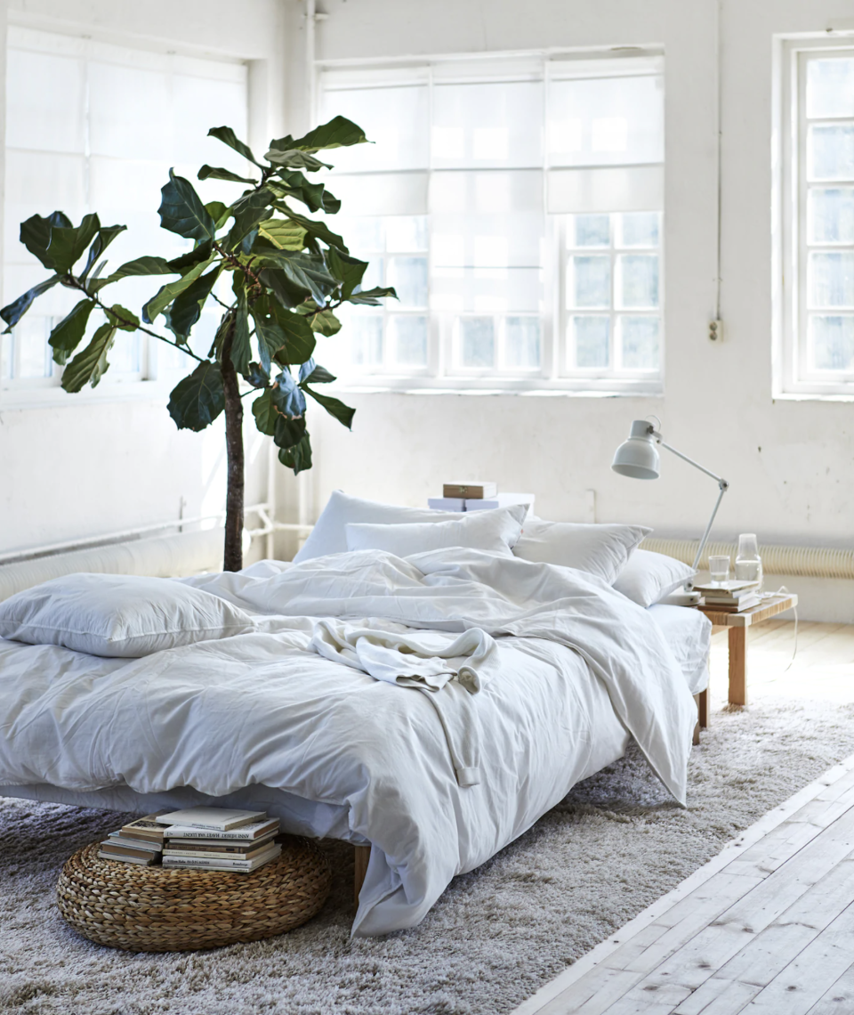 <p> We are not sure how realistic this Ikea bedroom idea above actually is, but we LOVE it and we are sure you can copy some elements from this space. Maybe not the &apos;nothing else in your bedroom but a bed and tree&apos; part, but you could create a very relaxed, clean vibe. Give the walls a fresh coat of white paint, pick out some new white bedding and hey, you could even add the tree. We love the added texture of the rattan stool too. </p>