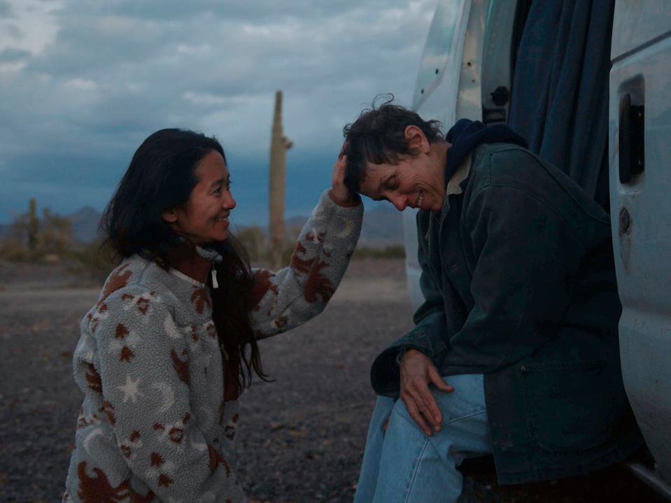 Chloé Zhao and star Frances McDormand on the set of ‘Nomadland’AP