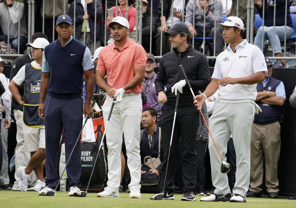 Tiger Woods of the United States, Jason Day of Australia, Rory McIlroy of Northern Ireland, and Hideki Matsuyama of Japan, from left to right, wait for the start of the Challenge: Japan Skins event ahead of the Zozo Championship PGA Tour at Accordia Golf Narashino C.C. in Inzai, east of Tokyo, Monday, Oct. 21, 2019. (AP Photo/Lee Jin-man)