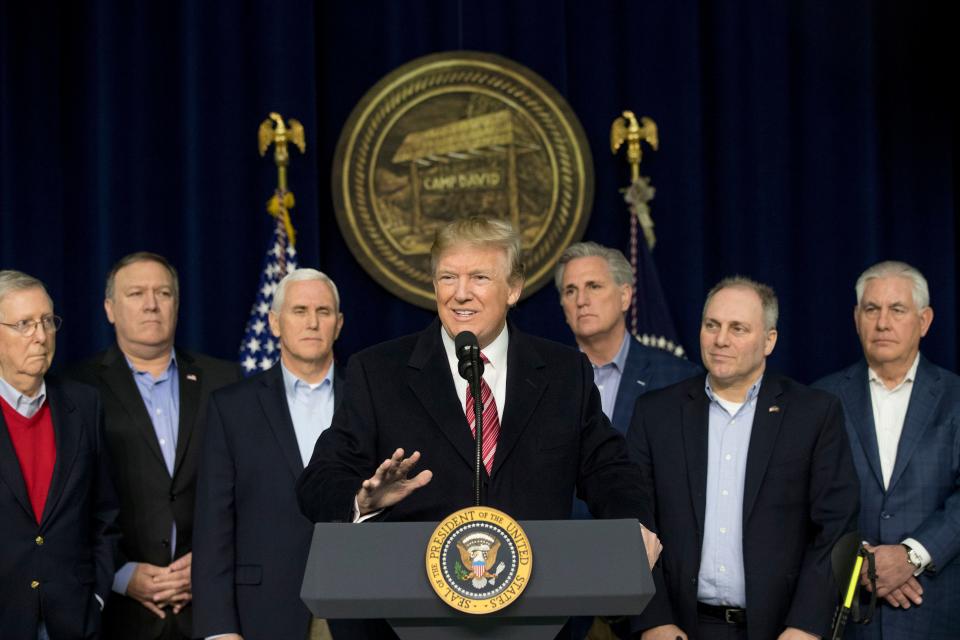 President Donald Trump, center, accompanied by from left, Senate Majority Leader Mitch McConnell of Ky., Vice President Mike Pence, House Majority Leader Kevin McCarthy of Calif., House Majority Whip Steve Scalise, R-La., Secretary of State Rex Tillerson, speaks after participating in a Congressional Republican Leadership Retreat at Camp David, Md., Jan. 6, 2018.
