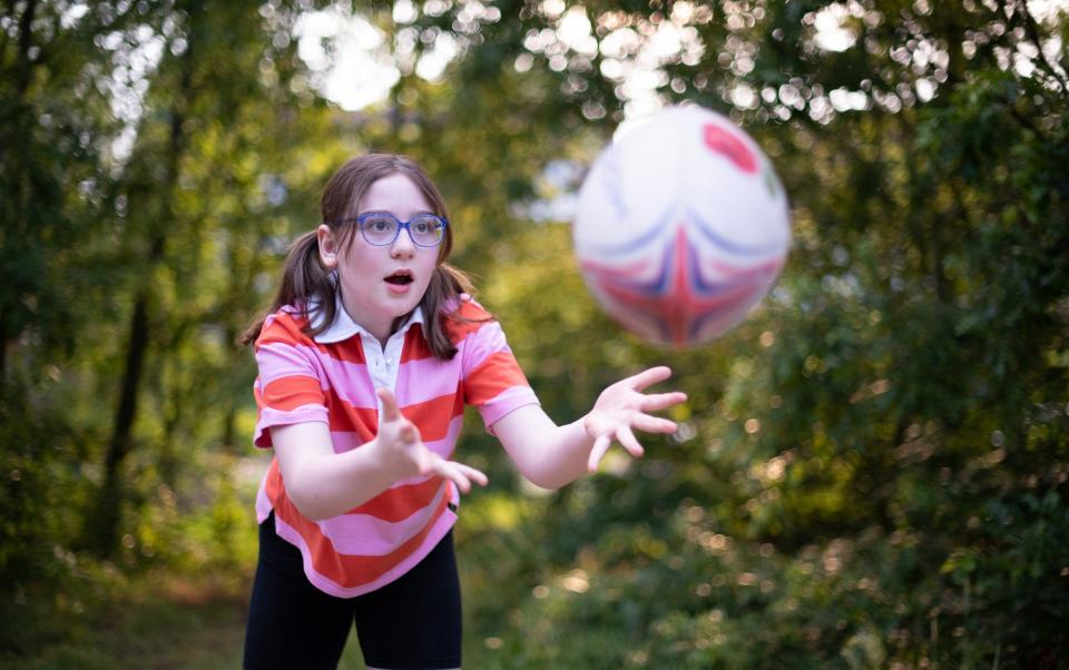 Penny playing rugby - Claudine Hartzel