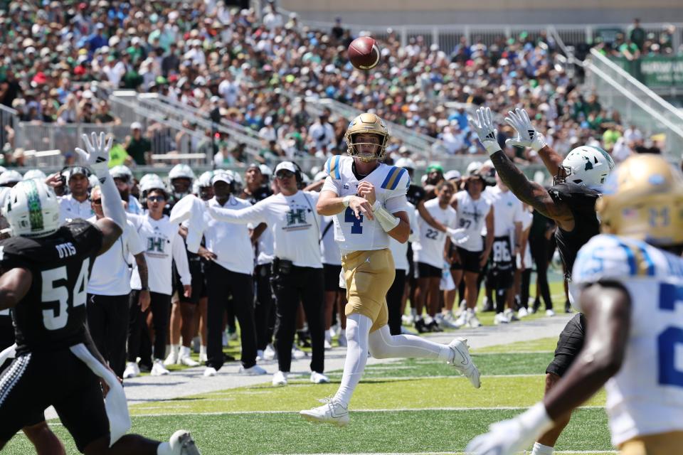 Aug 31, 2024; Honolulu, Hawaii, USA; UCLA Bruins quarterback Ethan Garbers (4) throws an end zone interception against the Hawaii Rainbow Warriors during the first quarter of an NCAA college football game at the Clarence T.C. Ching Athletics Complex. Mandatory Credit: Marco Garcia-USA TODAY Sports