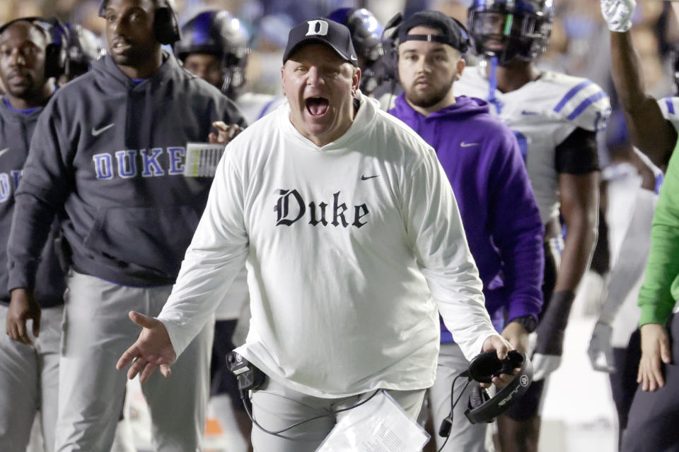 Duke coach Mike Elko reacts to a play during the first half of the team's NCAA college football game against North Carolina, Saturday, Nov. 11, 2023, in Chapel Hill, N.C. (AP Photo/Chris Seward)