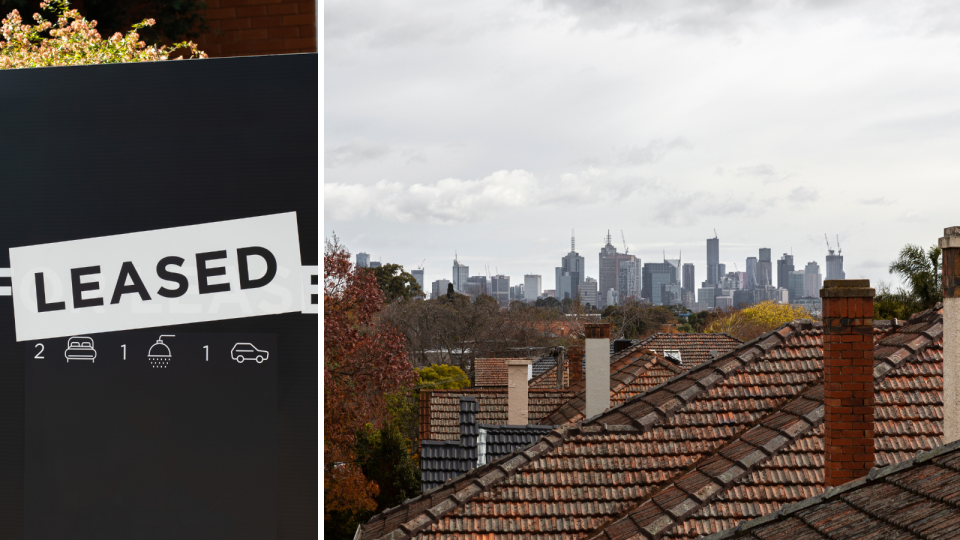 A sign out the front of a home that was for rent but has a sticker on it to indicate it has been leased and the roofs of houses and the CBD in the background.