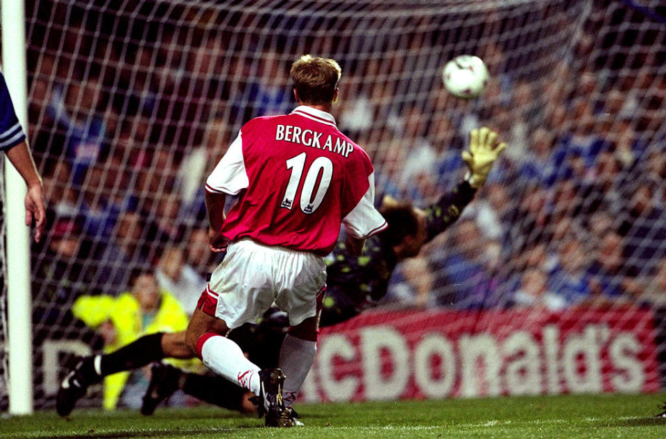 Dennis Bergkamp of Arsenal beats Kasey Keller in the Leicester City goal to score the late equaliser in the FA Carling Premiership match at Filbert Street in Leicester, England. The game ended 3-3.