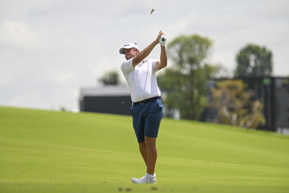 Richard Bland from England plays a shot on the 10th hole during LIV Golf Invitational Bangkok 2022 at Stonehill Golf Club in Pathum Thani, Thailand, Saturday, Oct. 8, 2022. (AP Photo/Kittinun Rodsupan)