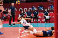 <p>USA's Justine Wong-Orantes hits the ball in the women's quarter-final volleyball match between USA and Dominican Republic during the Tokyo 2020 Olympic Games at Ariake Arena in Tokyo on August 4, 2021. (Photo by Yuri CORTEZ / AFP)</p> 
