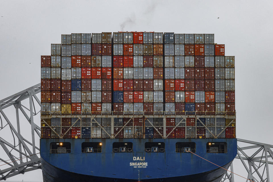 Wreckage of the Francis Scott Key Bridge rests on the container ship Dali, Wednesday, April 3, 2024, in Baltimore. (AP Photo/Julia Nikhinson)