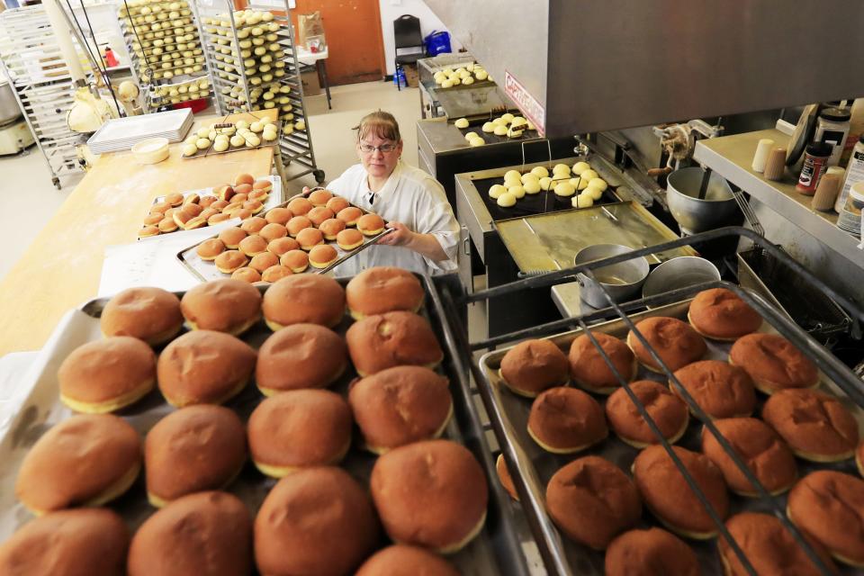 In this archive photo, Janice Smurawa finishes a batch of paczki at Smurawa's Country Bakery in Pulaski.