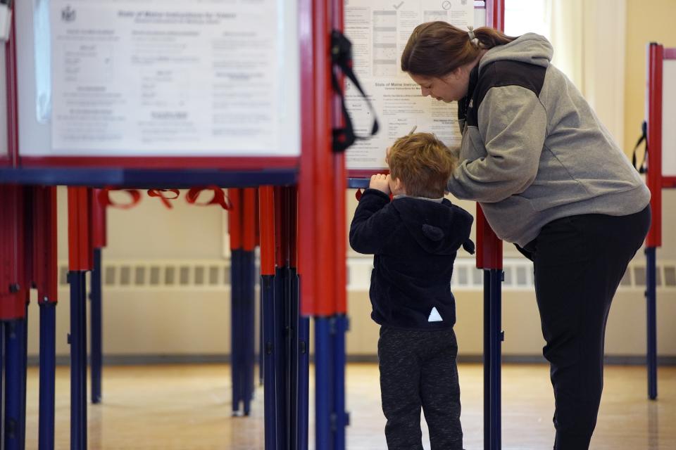 A voter marks a ballot at the polling station in Kennebunk, Maine, Tuesday, March 5, 2024. Super Tuesday elections are being held in 16 states and one territory. Hundreds of delegates are at stake, the biggest haul for either party on a single day. (AP Photo/Michael Dwyer)