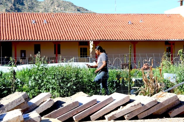 Sterling Johnson working on the gardens (Deborah Fallows / The Atlantic)