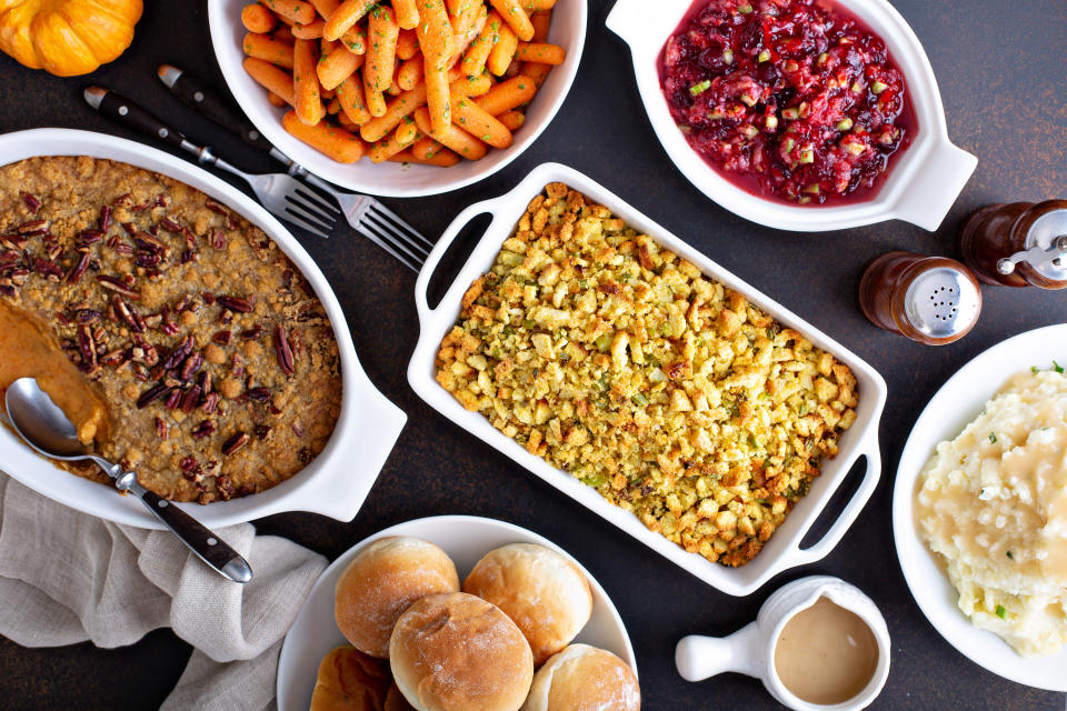 stuffing, sweet potatoes, corn, and other side dishes