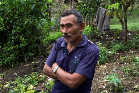 Domingo Caal, 61, grandfather of Jakelin, a 7-year-old girl who died in U.S. custody, stands outside her house in Raxruha, Guatemala December 15, 2018. REUTERS/Josue Decavele