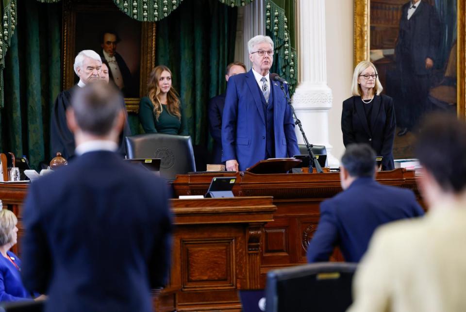 From left: Nathan Hecht, chief justice of Texas Supreme Court, Lt. Gov. Dan Patrick and former judge Lana Myers, the legal counsel for the presiding officer, stand at the dais before the first day of Texas Attorney General Ken Paxton’s impeachment trial in the Texas Senate chambers at the Texas State Capitol in Austin on Tuesday, Sept. 5, 2023.