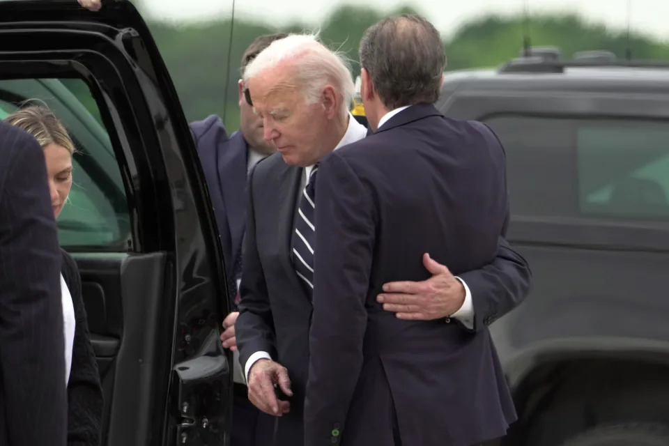 President Joe Biden greets his son Hunter Biden at Delaware Air National Guard Base in New Castle, Del., Tuesday, June 11, 2024. (AP Photo/Manuel Balce Ceneta)